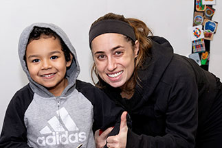 A mother and son smiling. Links to Gifts of Life Insurance