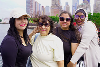 Group of women smiling. Link to Life Stage Gift Planner Under Age 60 Situations.