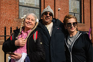 Group of people smiling. Link to Life Stage Gift Planner Ages 60-70 Situations.