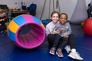 Two children smiling. Links to Closely Held Business Stock