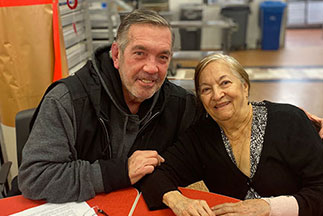 Two people smiling. Links to Gifts by Will